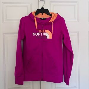The North Face Fuchsia and Peach zip up fleece jacket.